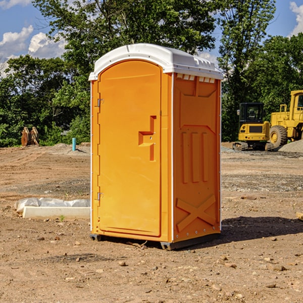 how often are the porta potties cleaned and serviced during a rental period in Woodland Washington